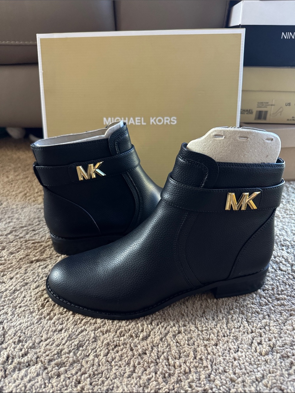 Women’s Michael Kors Black faux Leather MK Logo Ankle Booties with Gold accents